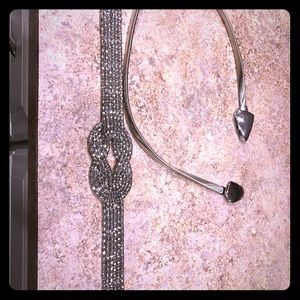 Two silver belts